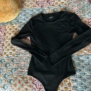 Black long sleeve Nuuds bodysuit